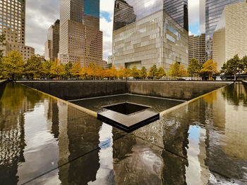 Reflection of skyscrapers in water at 9/11 memorial 