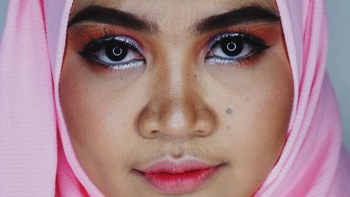 Close-up portrait of young woman