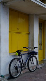 Bicycle parked outside building