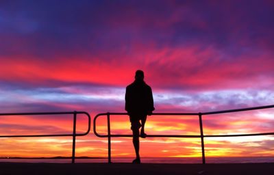 Silhouette of people at sunset