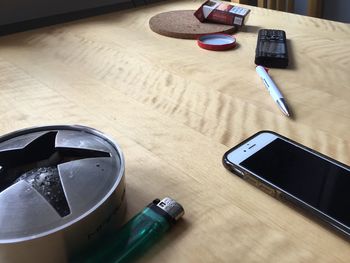 High angle view of smart phone on table