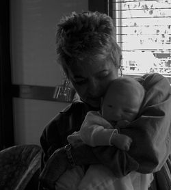 Grandmother with grandson at home