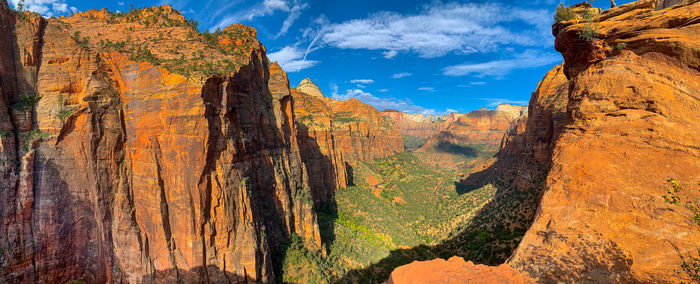 Panoramic view of rock formations against sky