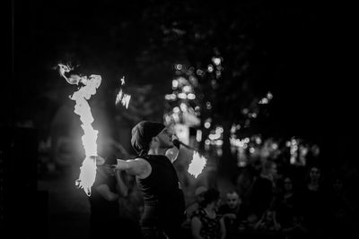 Group of people enjoying at music concert