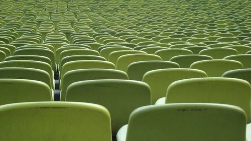 Empty chairs in row