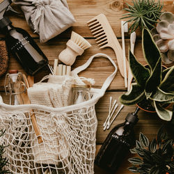 High angle view of potted plant and accessories on table