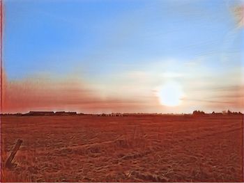 Scenic view of landscape against sky during sunset