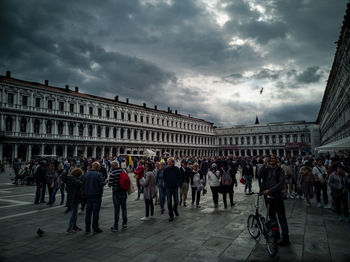 Group of people in front of historical building