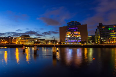 Illuminated city at waterfront