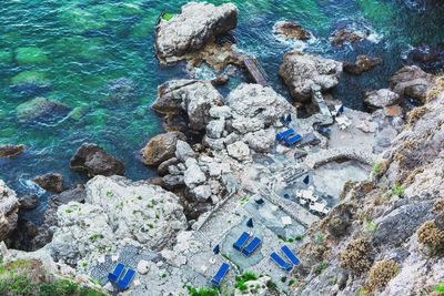 High angle view of rocks at shore