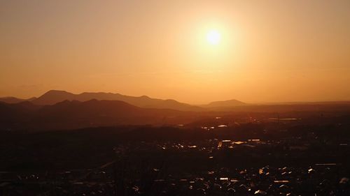 Scenic view of landscape against sky during sunset