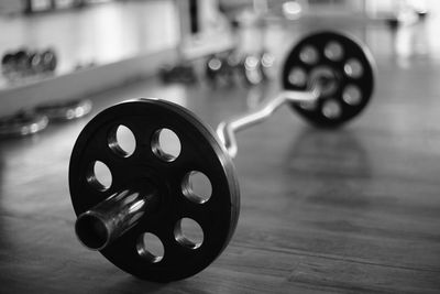 Close-up of barbell in gym