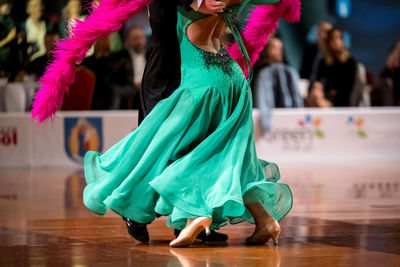 Low section of woman standing on floor
