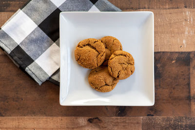 High angle view of cookies in plate on table