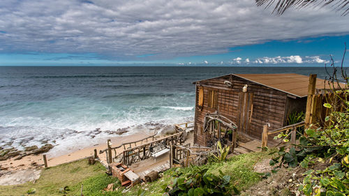 Scenic view of sea against cloudy sky