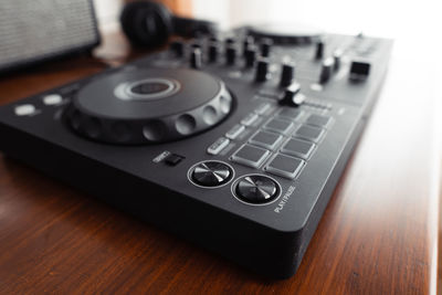 Close-up of audio equipment on table