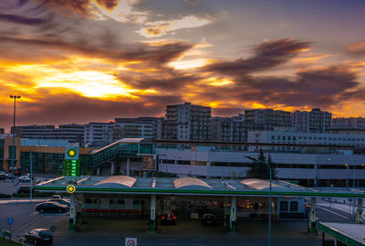 High angle view of buildings against sky during sunset