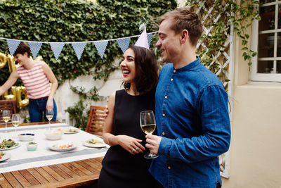 Smiling couple celebrating birthday