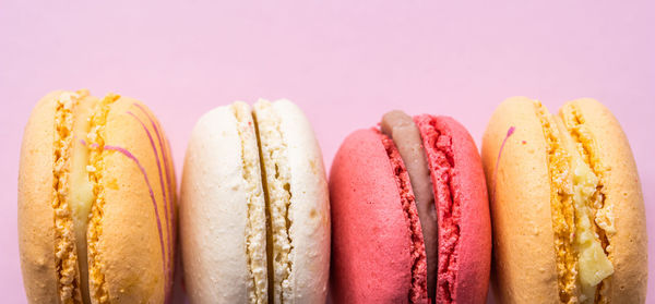 Close-up of food against pink background