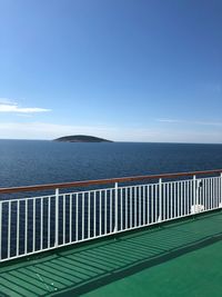 Scenic view of sea against blue sky