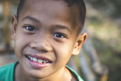 Close-up portrait of smiling boy