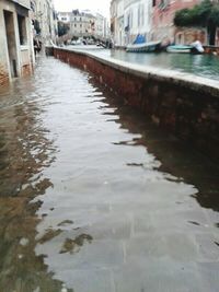 View of canal along buildings