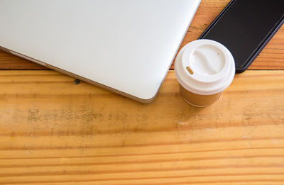High angle view of coffee cup on table