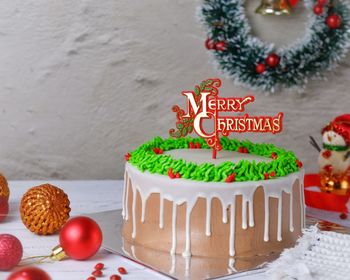 Close-up of christmas decorations on table