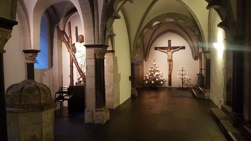 Illuminated corridor of cathedral