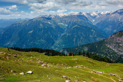 Scenic view of snowcapped mountains against sky