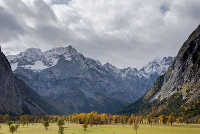 Scenic view of snowcapped mountains against sky