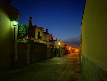 Illuminated street at night