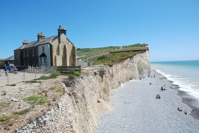 View of sea against clear blue sky