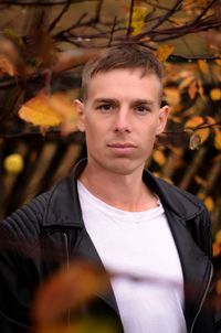 Portrait of young man standing outdoors