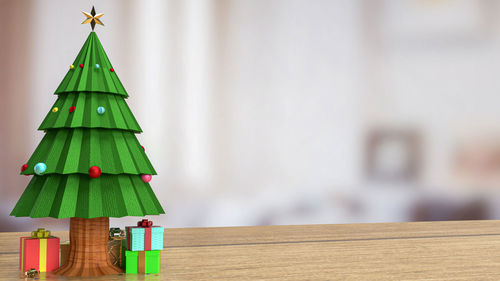 Close-up of christmas tree on table