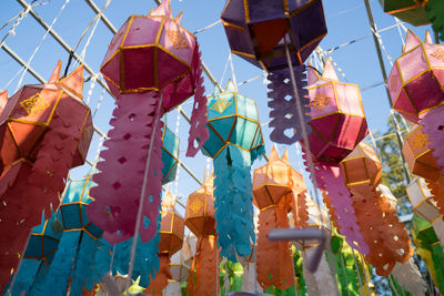 Low angle view of decoration hanging against sky