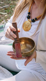 Midsection of woman holding food