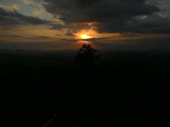 Scenic view of landscape at sunset