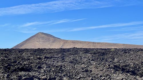 Scenic view of desert against sky