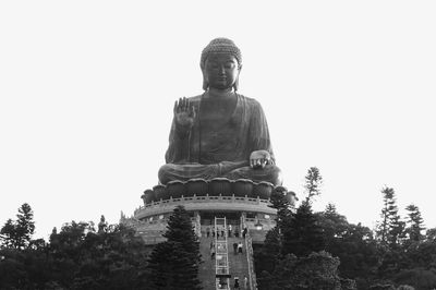 Low angle view of statue against clear sky