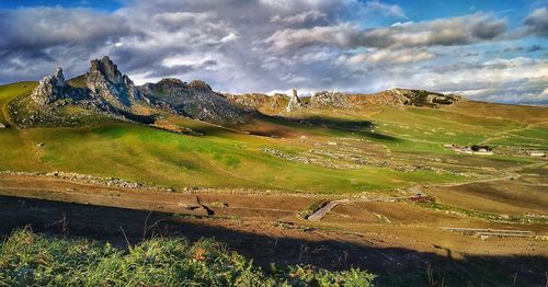 Panoramic view of landscape and mountains against sky