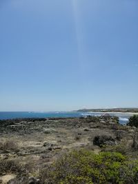 Scenic view of sea against clear sky