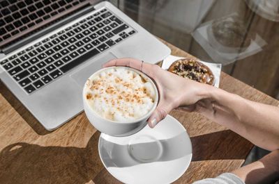High angle view of woman preparing food