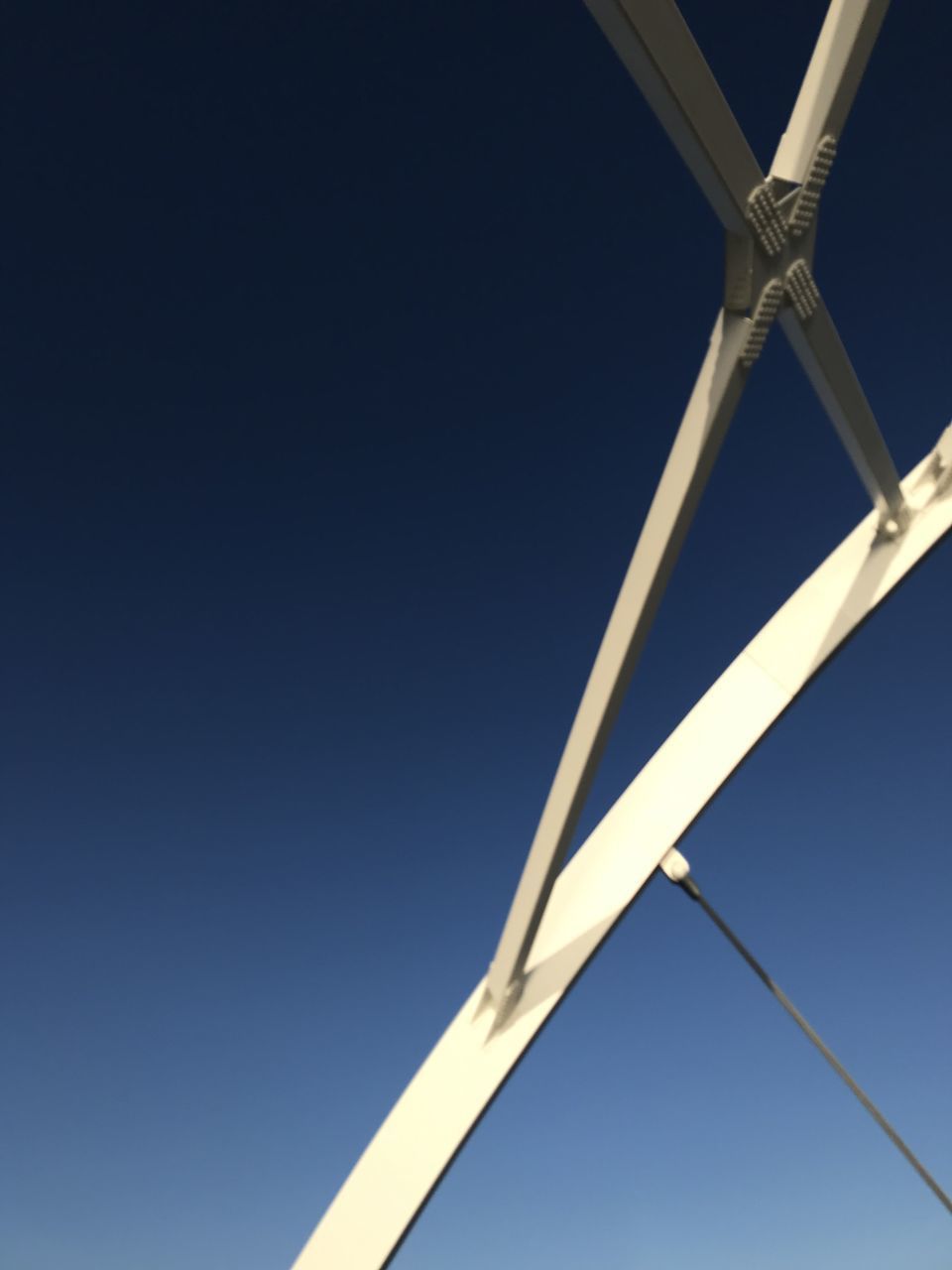 LOW ANGLE VIEW OF WIND TURBINE AGAINST SKY