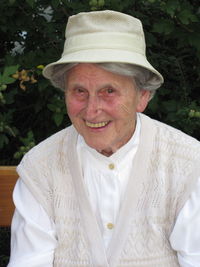 Portrait of happy senior woman at park