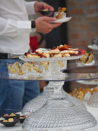 Midsection of man preparing food