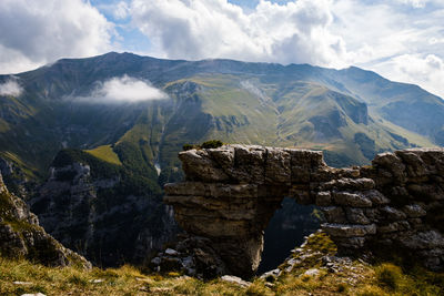 Scenic view of rocky mountains against sky