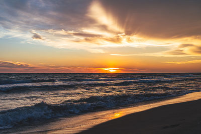 Scenic view of sea against sky during sunset