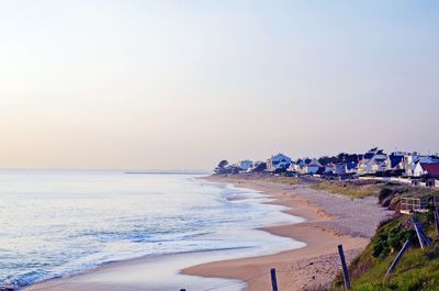 Scenic view of sea against clear sky