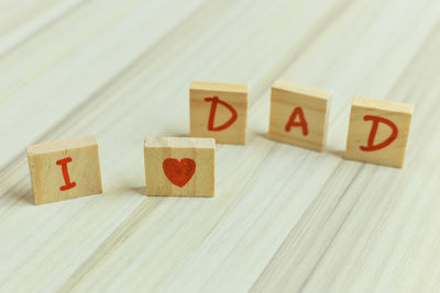 High angle view of wooden letter blocks on table